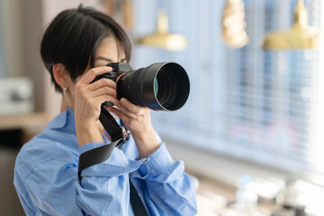 女性　フォトグラファー　カメラマン