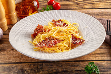 Italian classic spaghetti carbonara with bacon and egg