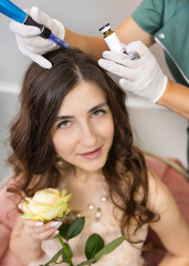 young woman in beauty salon doing hair care