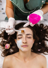 young woman in beauty salon skin care 