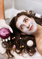 young woman in beauty salon skin care procedure