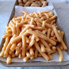 french fries on a wooden board Crispy biscuit in the oven