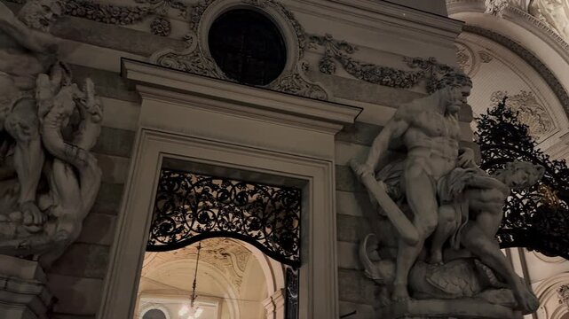 Detail of the Albrechtsbrunnen (Albrecht Fountain) in Vienna, featuring dynamic white marble sculptures of mythical figures and an eagle. A prominent landmark at the Hofburg Palace.

