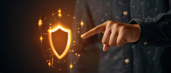 Hand touching holographic shield with glowing padlock icons representing cyber protection, online security, and digital privacy technology.
