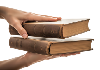 Hand holding stack of old books isolated on transparent background, concept of knowledge