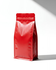 Isolated red stand-up pouch packaging mockup on a clean white surface with sharp geometric lighting.