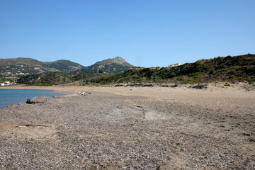 Kefalonia- Greece - August 15, 2025: Mounda beach needs Skala, Kefalonia,  Greece.
