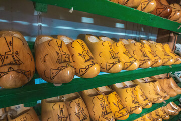 Classic wooden clogs in a display cabinet in an old factory in the Netherlands