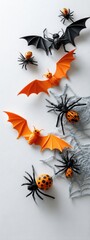 Vibrant orange bats and dark spiders creating spooky Halloween decorations. Creepy crawlers and silver webs on a bright white background for holiday design.