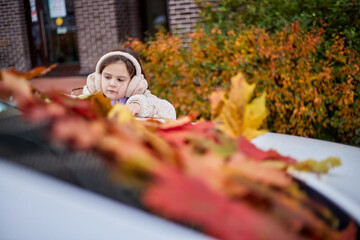 Children enjoying autumn in the park