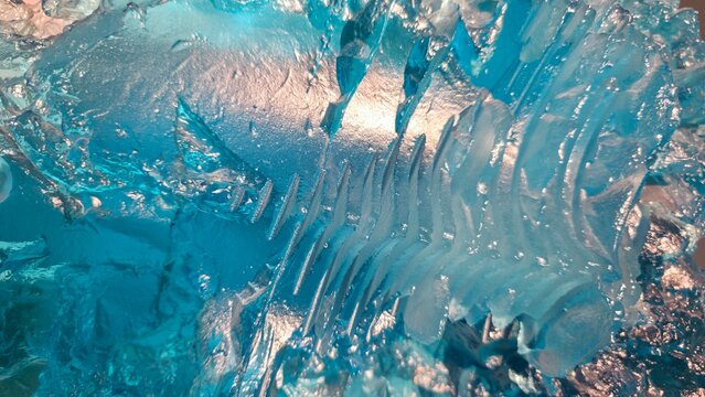 Blue cracked stained hand blown glass artwork abstract background