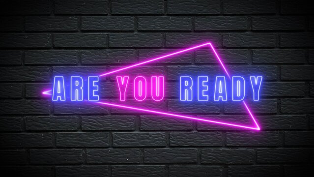 Get ready for an exciting challenge with vibrant neon text on a stylish black brick wall background, sparking anticipation and energy