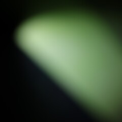 Fototapeta premium Una toma de cerca de un fondo abstracto de color verde con negro con un degradado ligero desenfocado