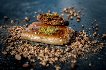 Traditional Palestinian Kulaj Sweet with Cheese  or Walnut Filling and Pistachio Garnish 