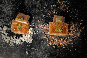 Traditional Palestinian Kulaj Sweet with Cheese  or Walnut Filling and Pistachio Garnish 