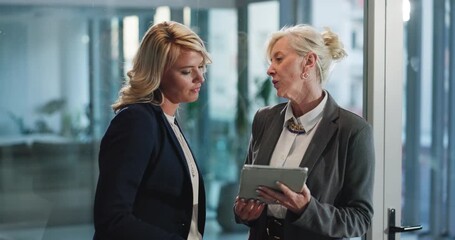 Talking, lawyer or woman with tablet in office, review court case or legal advice from senior attorney. Lawsuit draft, teamwork and people with tech for defense ideas, discussion and appeal statement - Powered by Adobe