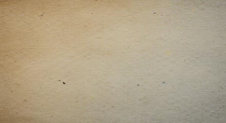 Close-up view of a textured beige surface with subtle imperfections.