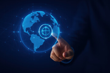 Person interacts with digital globe, highlighting specific location with glowing circle. image conveys sense of technology and global connectivity