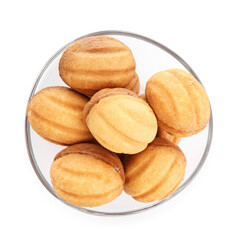 Delicious nut shaped cookies with boiled condensed milk in glass bowl isolated on white, top view