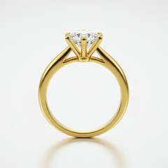 Single solitaire gemstone set in polished yellow precious metal circlet is displayed against a pale background