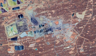 Olympic Dam Mine, Australia: High-Resolution Aerial View of Industrial Complex and Colored Tailings Dams in the Outback