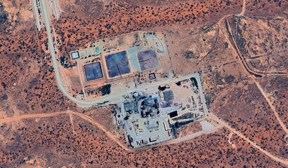 Olympic Dam Mine, Australia: High-Resolution Aerial View of Industrial Complex and Colored Tailings Dams in the Outback