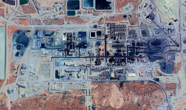 Olympic Dam Mine, Australia: High-Resolution Aerial View of Industrial Complex and Colored Tailings Dams in the Outback