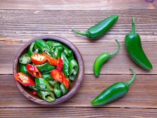  Flat lay of whole and sliced peppers.