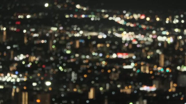 Defocused City Night Lights &mdash; Neon Bokeh Urban Background