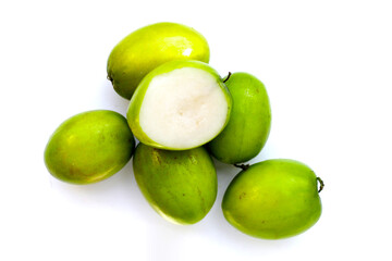 Green jujube fruits on white background.