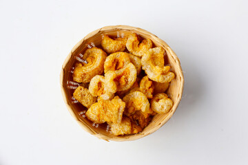 Crispy pork cracklings, a crunchy savory snack.