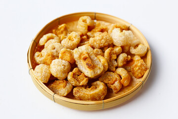Crispy pork cracklings, a crunchy savory snack.