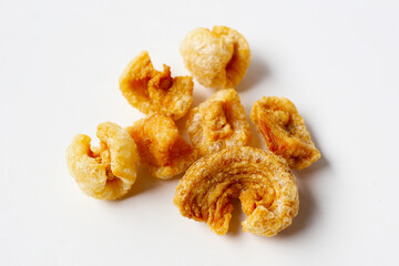Crispy pork cracklings, a crunchy savory snack.