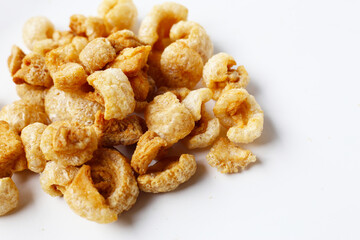 Crispy pork cracklings, a crunchy savory snack.