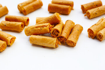 Rolled crispy wafers filled with shredded pork floss, Thai snack.