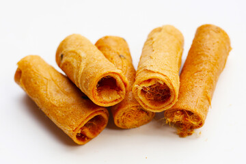 Rolled crispy wafers filled with shredded pork floss, Thai snack.
