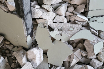 Broken concrete, Piles of lightweight construction bricks after house demolition
