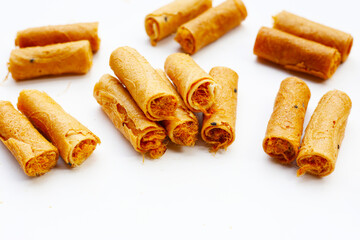 Rolled crispy wafers filled with shredded pork floss, Thai snack.