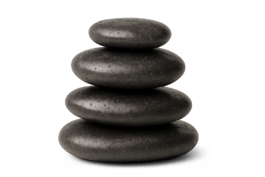 Black zen massage stones stacking, balancing relaxation concept