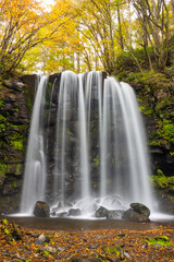 waterfall in autumn forest