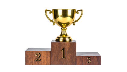 A gold trophy sits atop a wooden podium with three tiers numbered 1, 2, and 3, against black