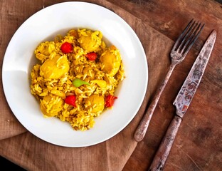 Traditional Brazilian dish of rice, chicken, and pequi (Brazilian caryocar), known as Goiana chicken stew.