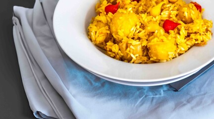 Traditional Brazilian dish of rice, chicken, and pequi (Brazilian caryocar), known as Goiana chicken stew.