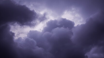 midgard. Dark purple storm clouds gathering before rainfall, dramatic sky formation, natural weather phenomenon. travel magazines, destination branding, designed for travel destination branding.
