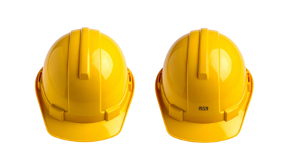 Two yellow construction helmets, facing front and back, isolated on a black background