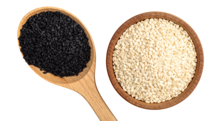 Overhead view shows a wooden spoon filled with black seeds and a bowl of white seeds