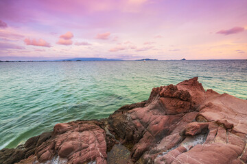 Beautiful sunset on the tropical sea at Pink Stone Yard, Channthaburi Province, Thailand.