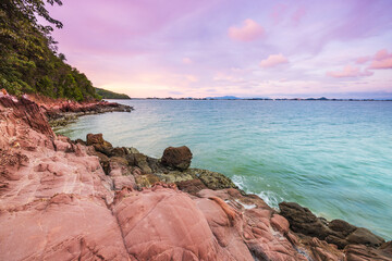 Beautiful sunset on the tropical sea at Pink Stone Yard, Channthaburi Province, Thailand.