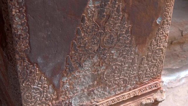 Floral patterns carved on the column of Angkor Wat, Cambodia. Shot in motion