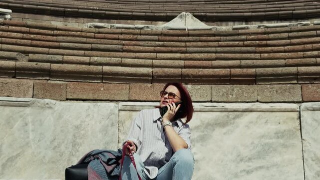 Archaeology Student Talking to Cellphone in the Ancient Rome Hospital Asclepieion of Pergamon